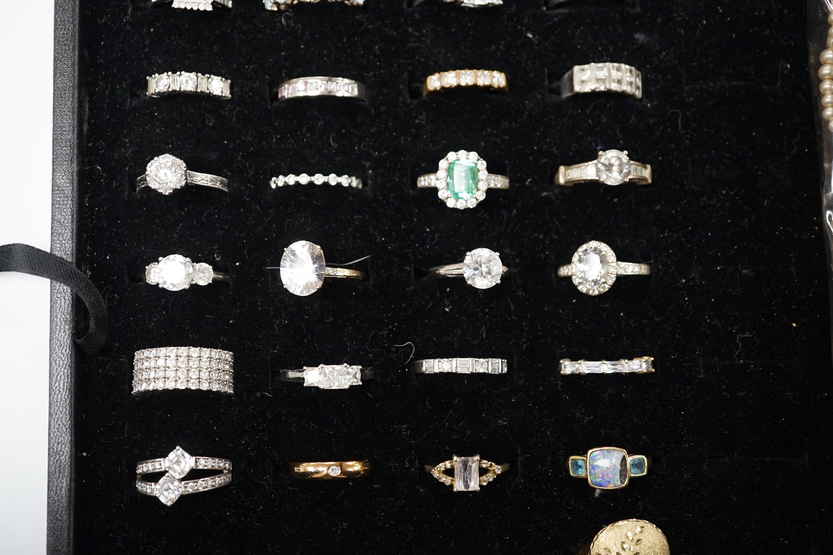 A collection of assorted paste set dress rings and sundry costume jewellery